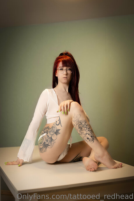 Tattooed Redhead