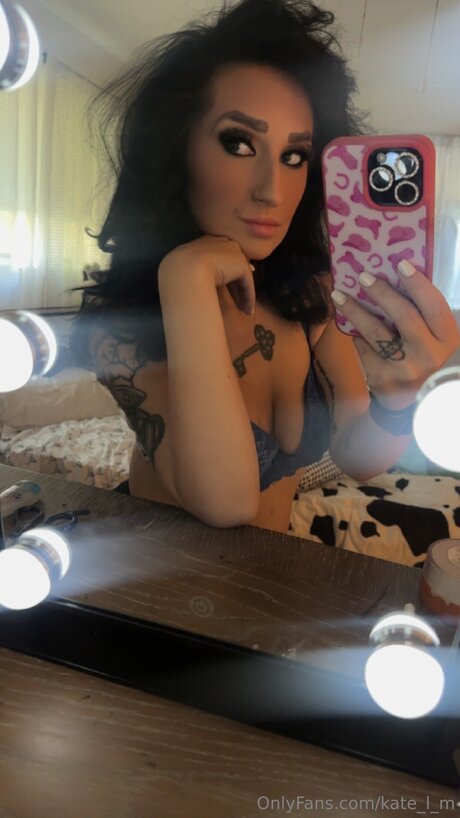 Kate L M
