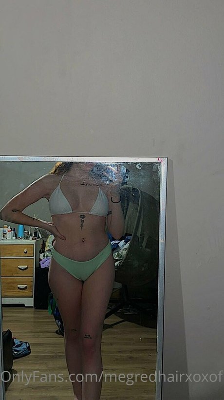 Naakte gelekte OnlyFans-foto van Megredhairxoxotease